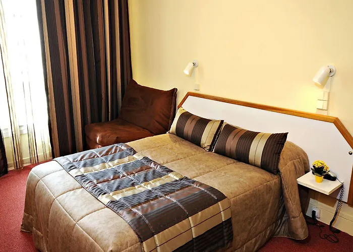 فندق Citotel Le Plat D'etain 2*